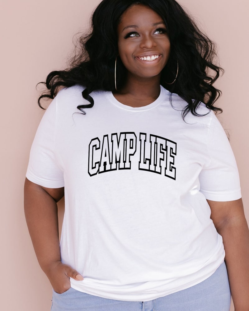 Front of a model wearing a size Large Camp Life Varsity in White by Simply Sage Market. | dia_product_style_image_id:281370